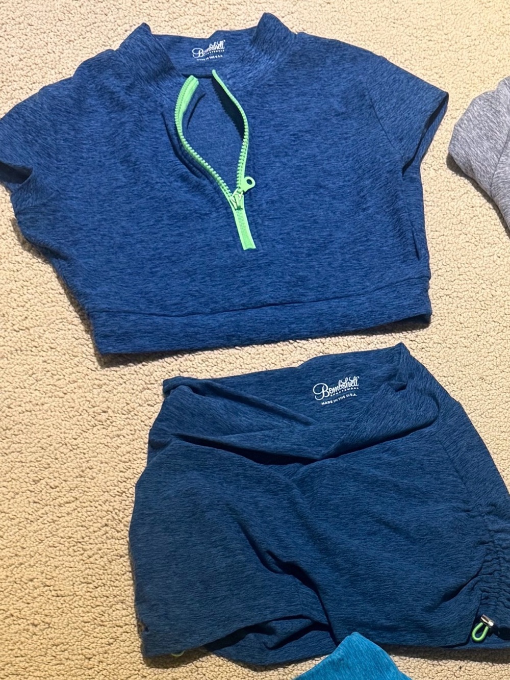Bombshell Sportswear Navy Blue Athletic Shorts with Green Accent
